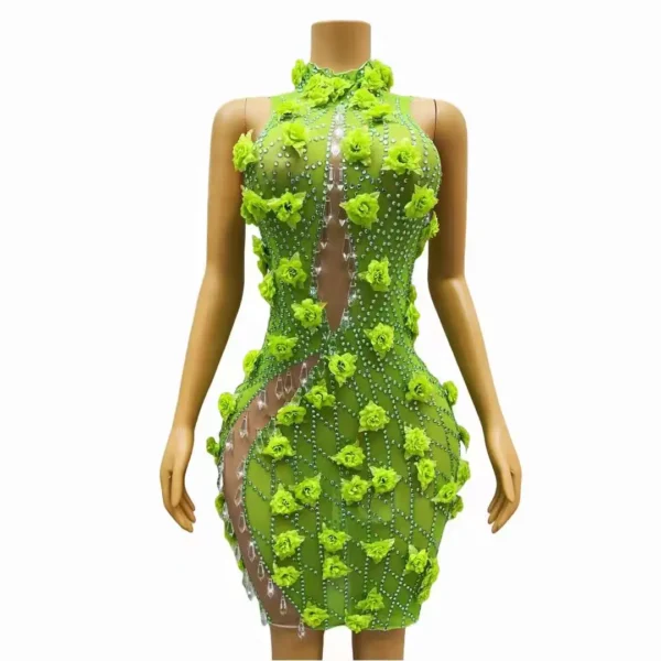 Green prom dress with rhinestones, mesh, and floral design for events