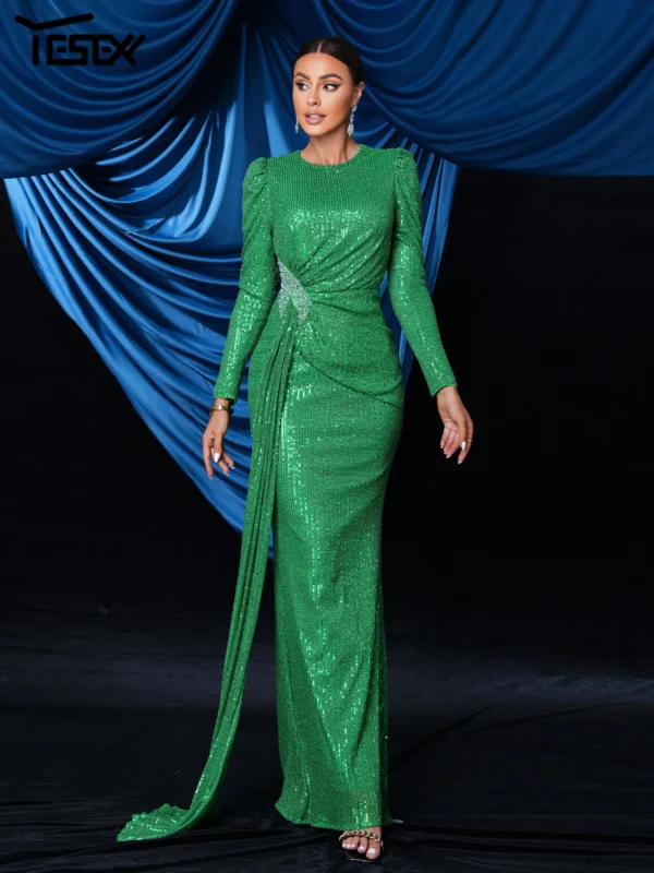 Green prom dress with sequins, long sleeves, and slim fit